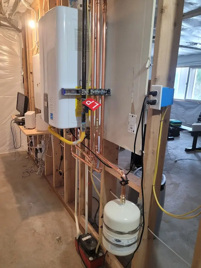 Licensed plumber repairing a kitchen sink in Brooklyn